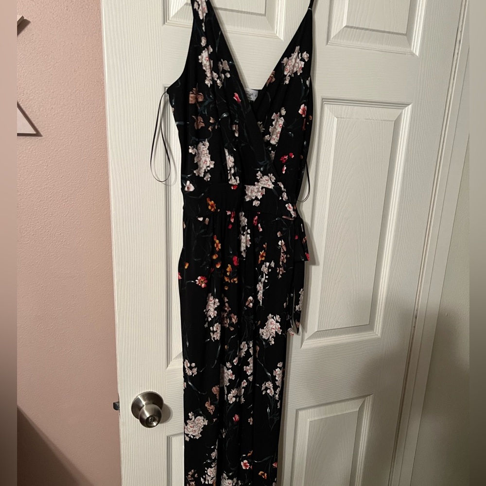 Brand new with tags black flowered jumpsuit size xl from Kaileion.
